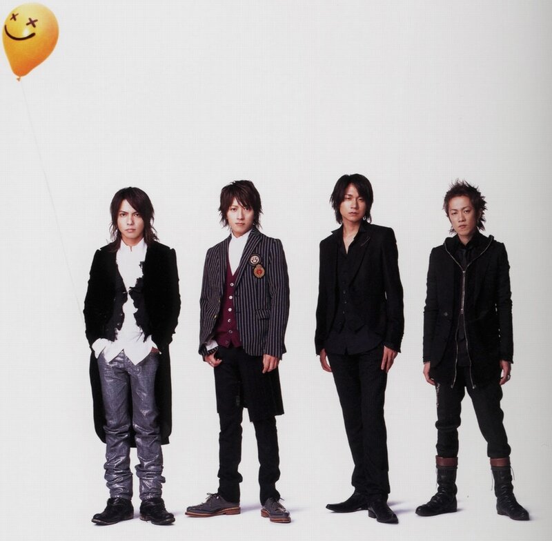 Four Men in Suits — Black, Neutral