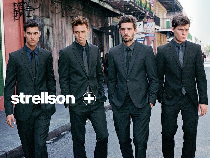 Four Men in Suits — Black, Serious, Afternoon