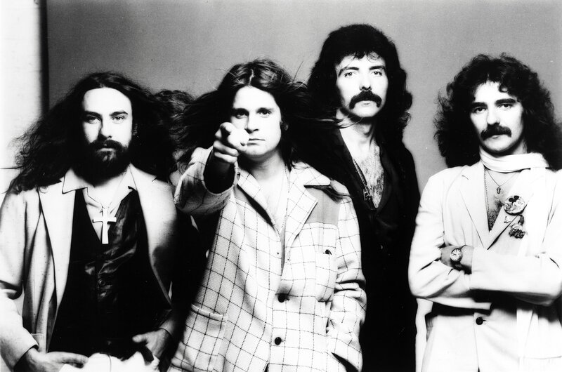 Four Men in Suits — Black, Serious, Photograph, Long Hair