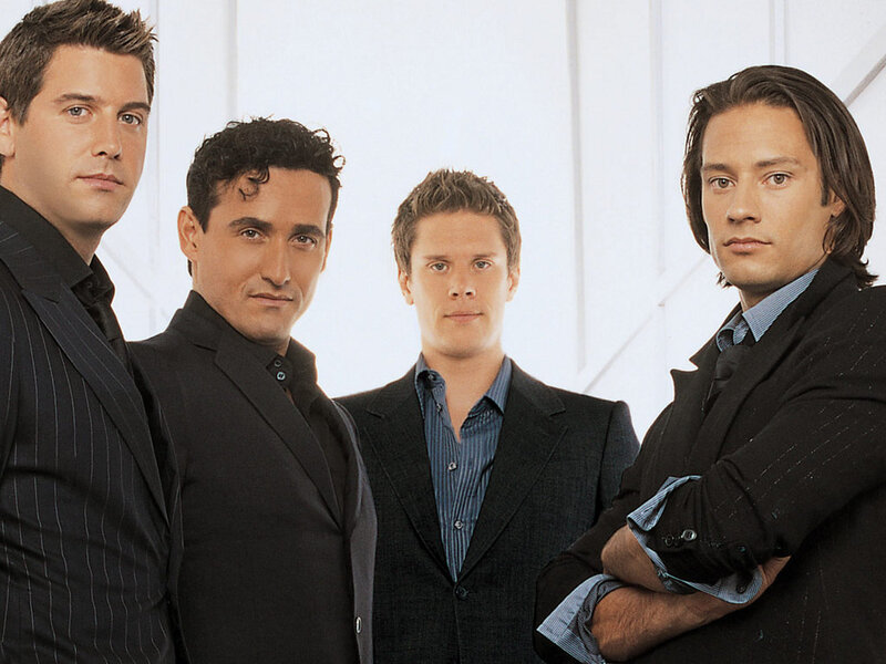 Four Men in Suits — Black, Serious, Photograph, Studio Background