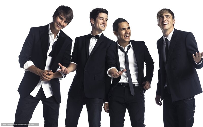 four men in suits laughing