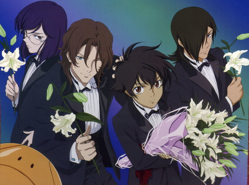 Four men in tuxedos with lilies
