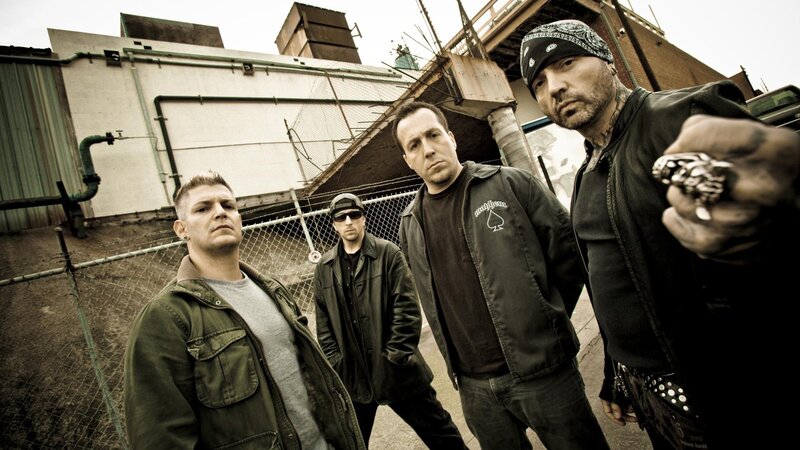 Four Men in Urban Setting — Black, Serious, Photograph