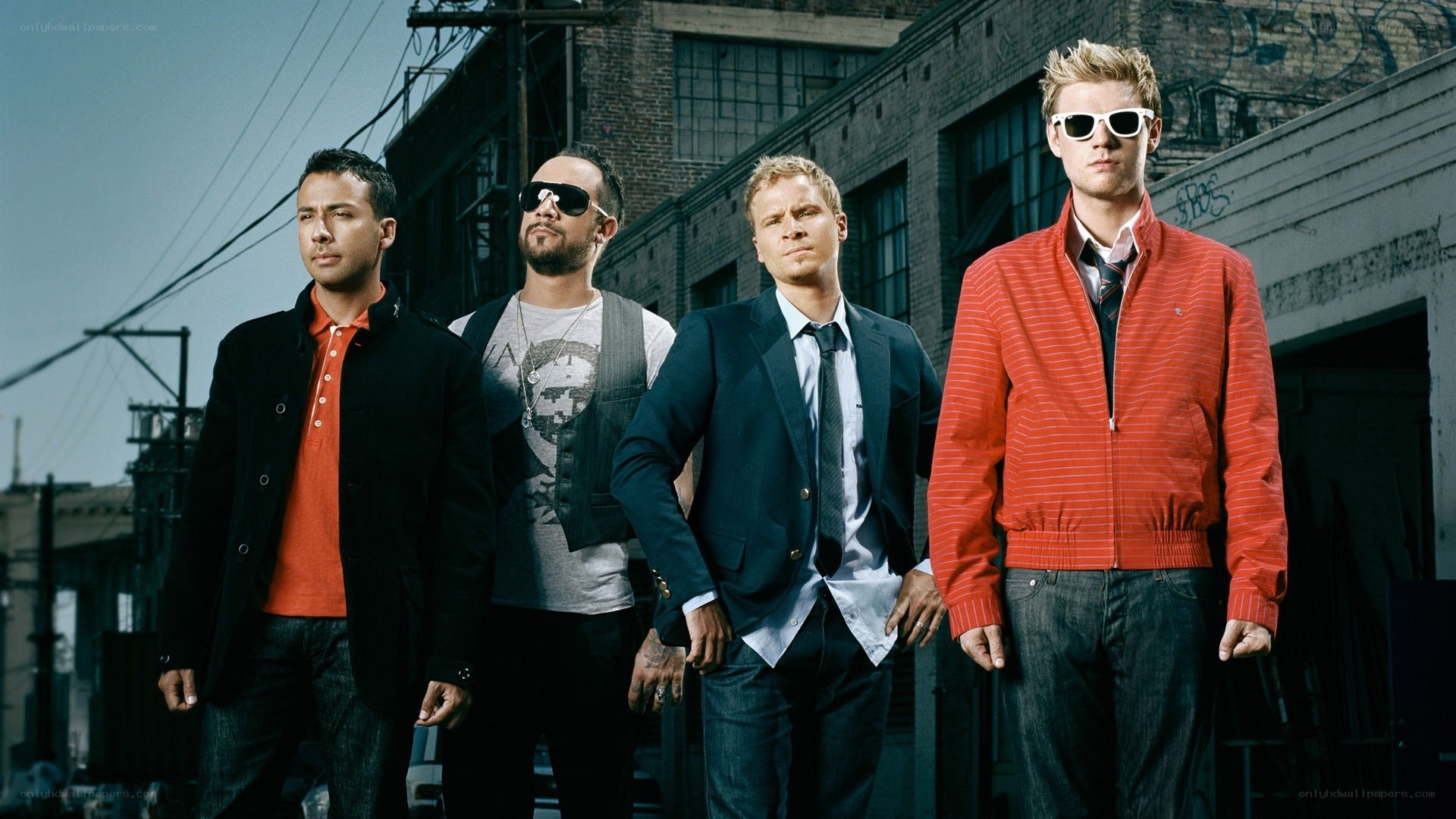 Four men in urban setting