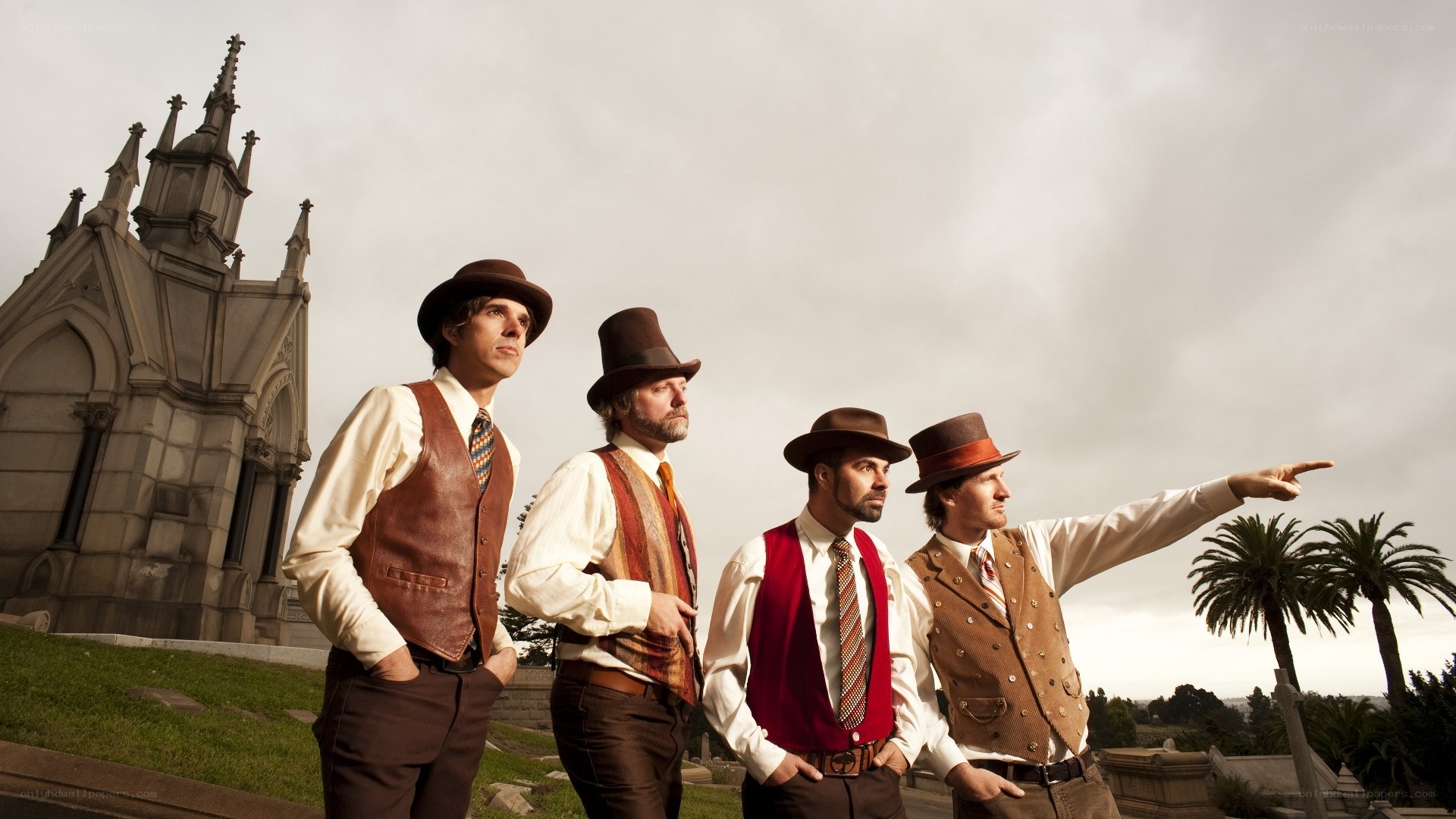 Four men in vintage attire