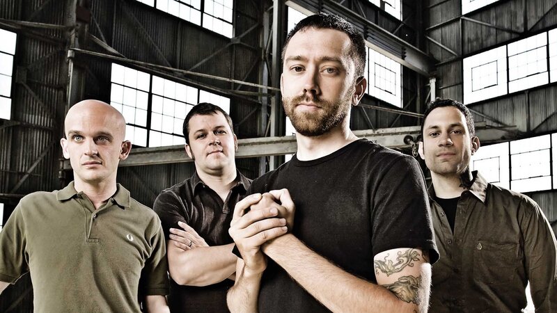 Four Men in Warehouse