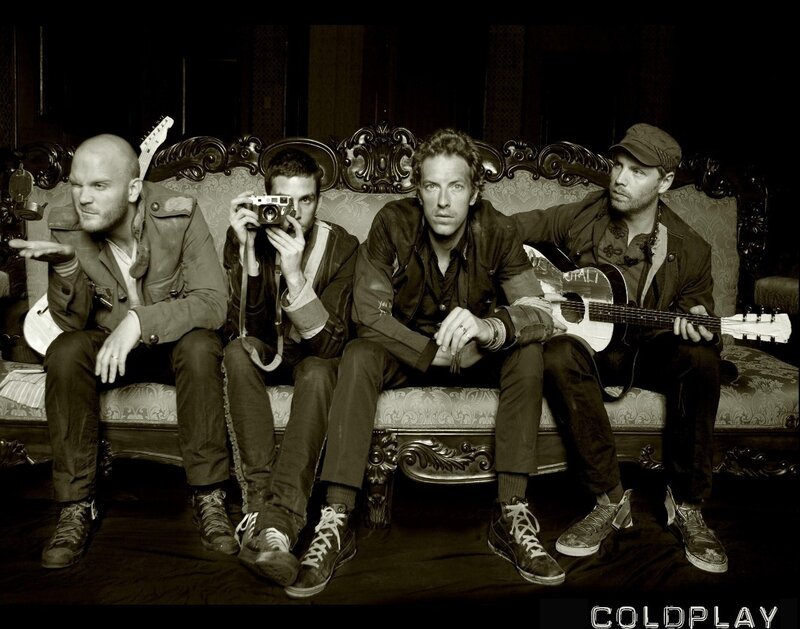 Four Men on a Couch — Black, Serious, Photograph, Guitars