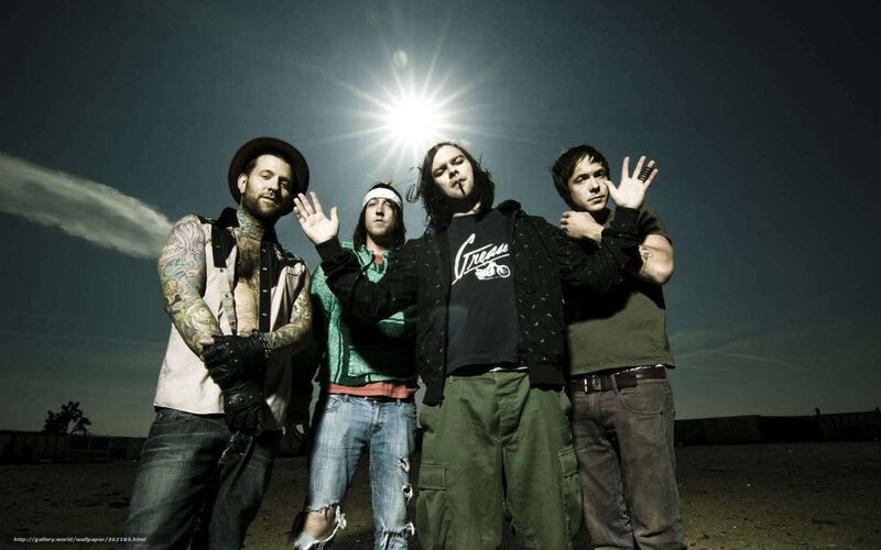 Four Men Posing in Desert