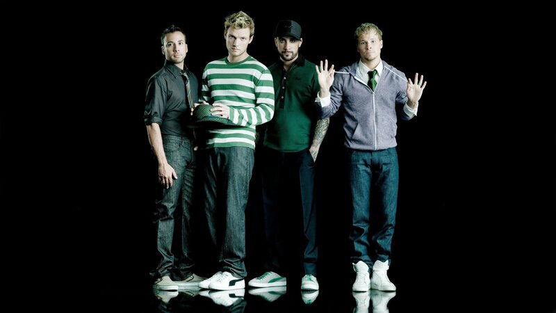 four men posing in studio