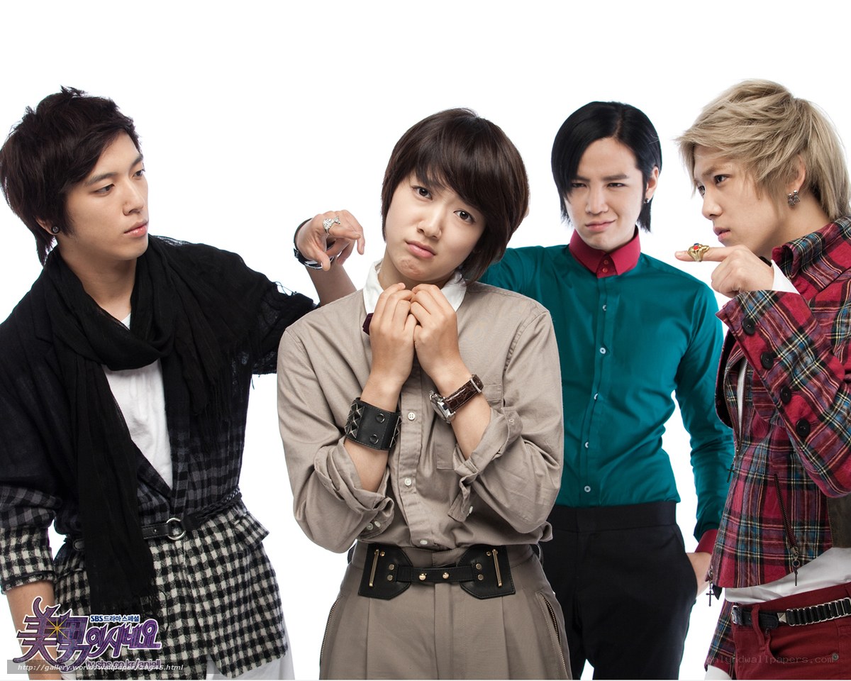 four men posing together