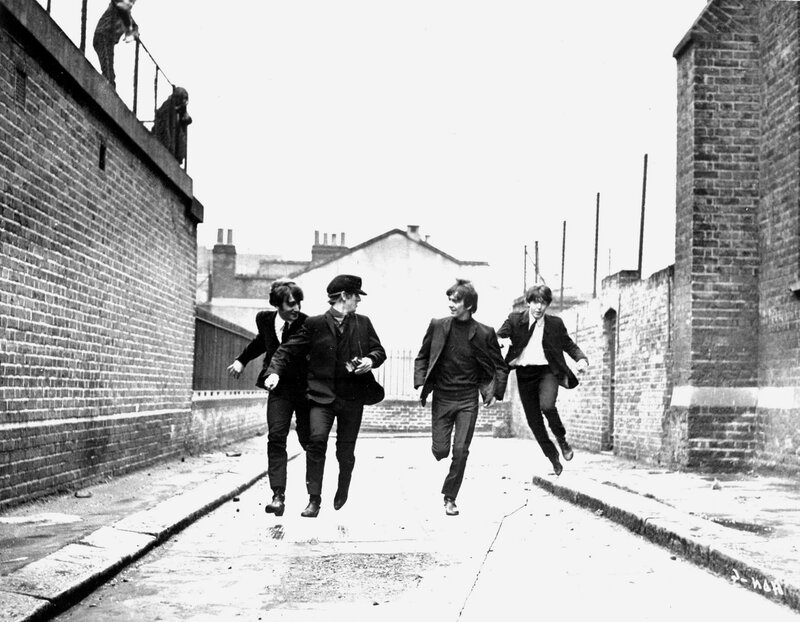 Four Men Running in Alley