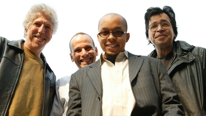 Four Men Smiling