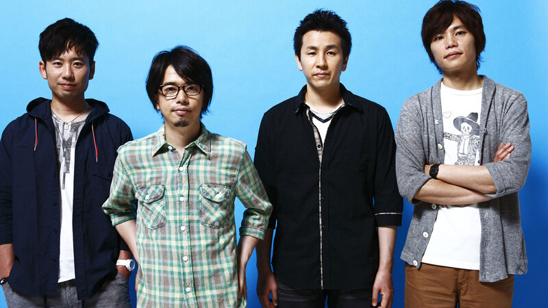 Four Men Standing — Blue, Neutral, Photograph