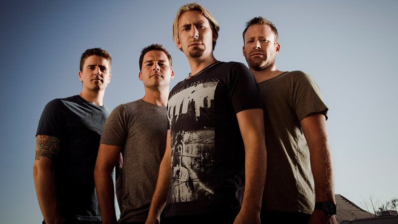 Four Men Standing — Blue, Serious