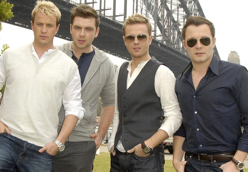 Four Men Standing Together — Blue