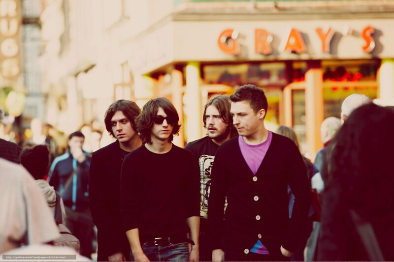 Four Men Walking on Street