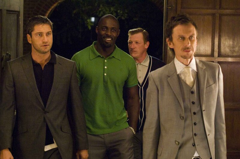 Four men walking together