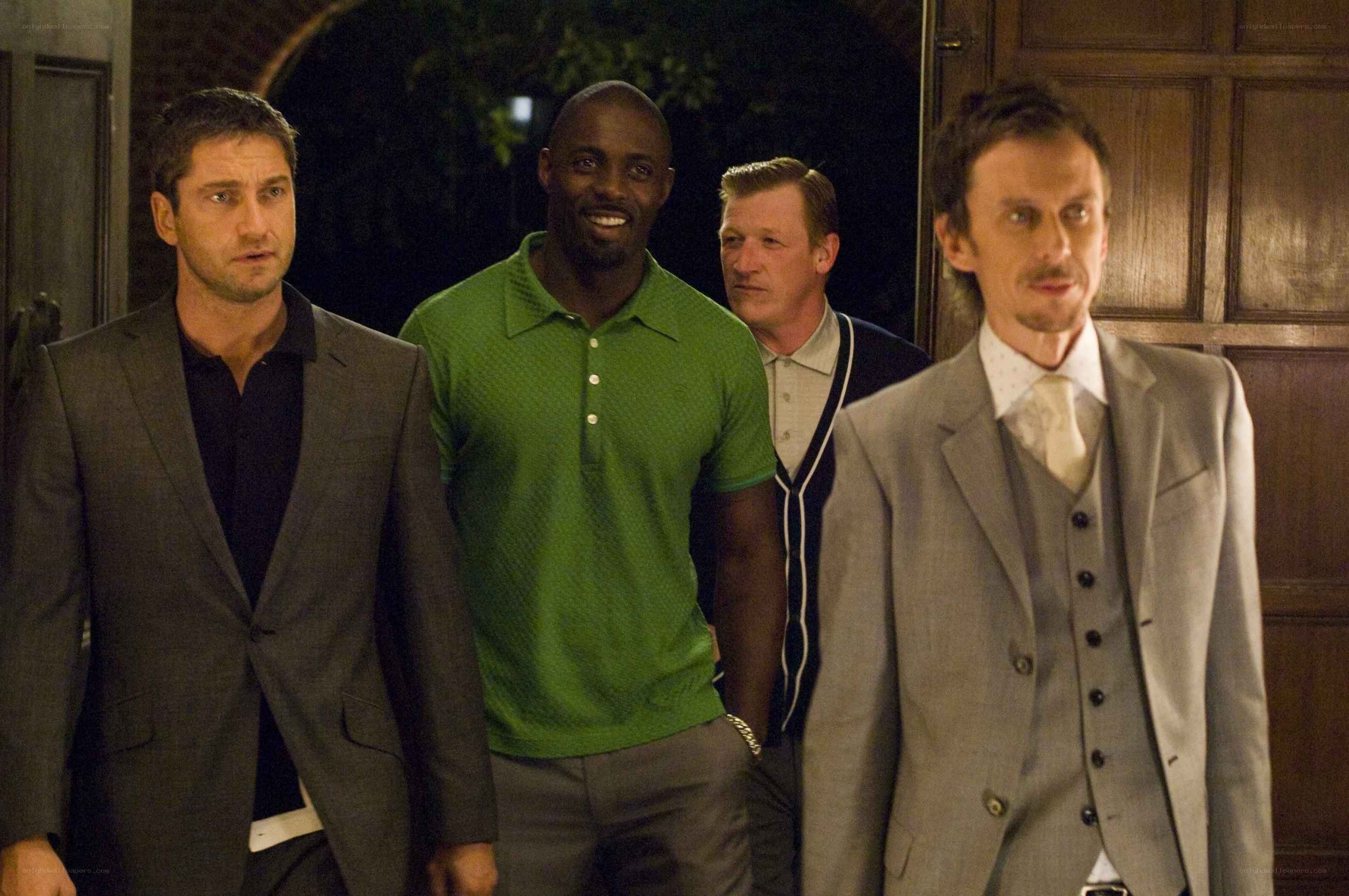 Four men walking together