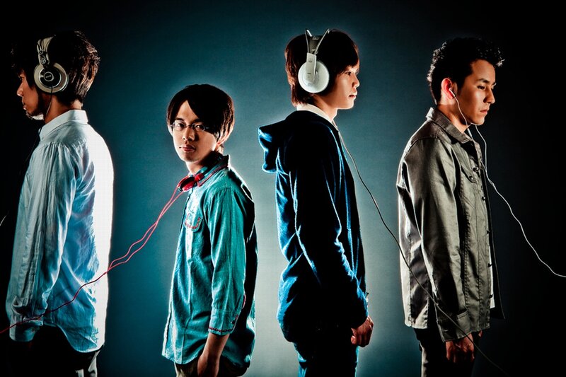 Four Men Wearing Headphones