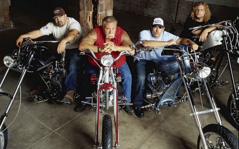 Four men with custom motorcycles