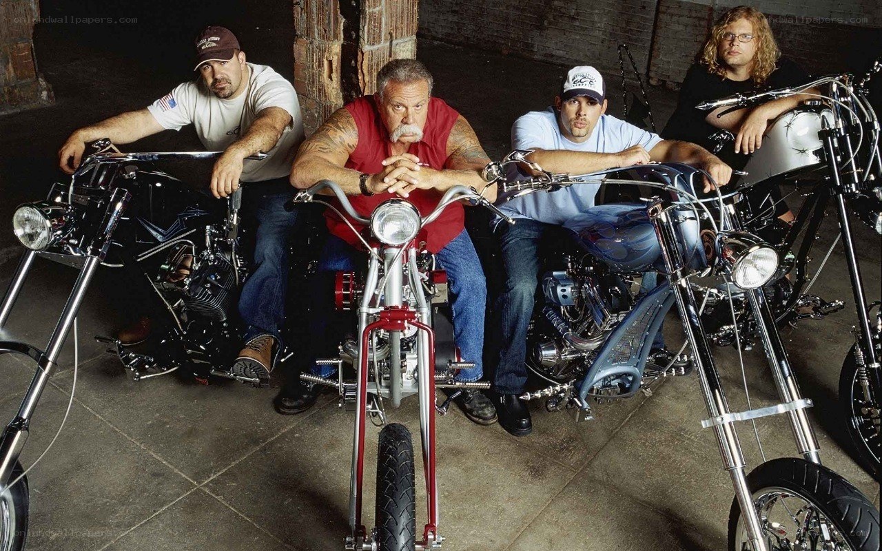 Four men with custom motorcycles
