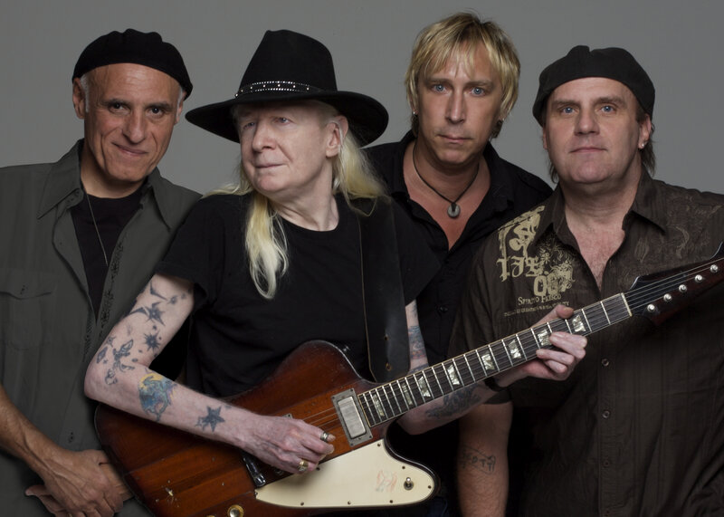 Four Men with Guitars