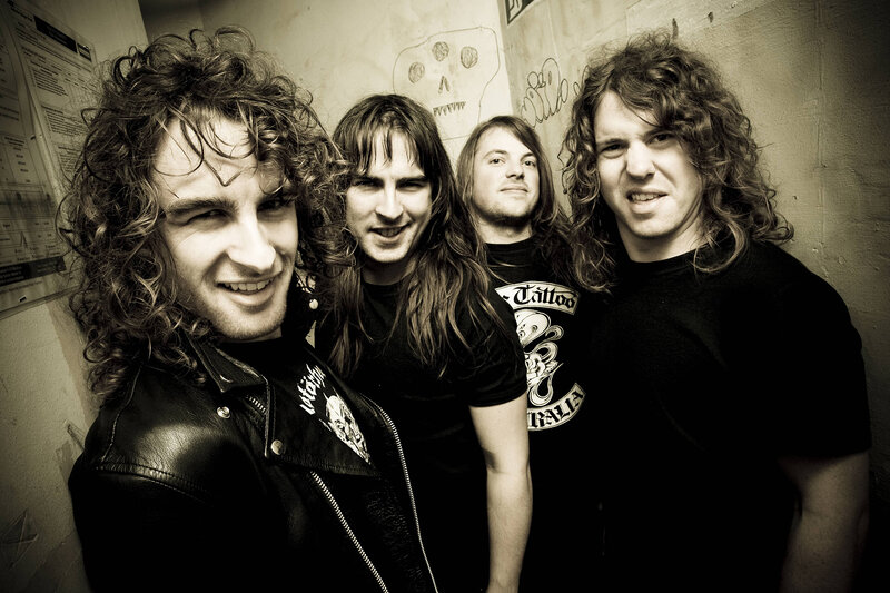Four Men with Long Hair — Black, Confident