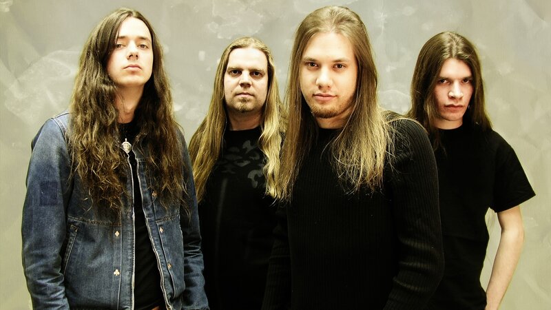 Four Men with Long Hair — Black, Serious, Photograph, Denim Jacket