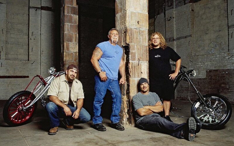 Four Men with Motorcycles