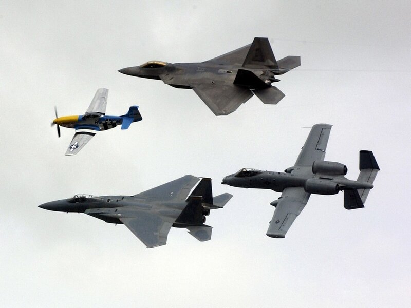 Four military aircraft in formation