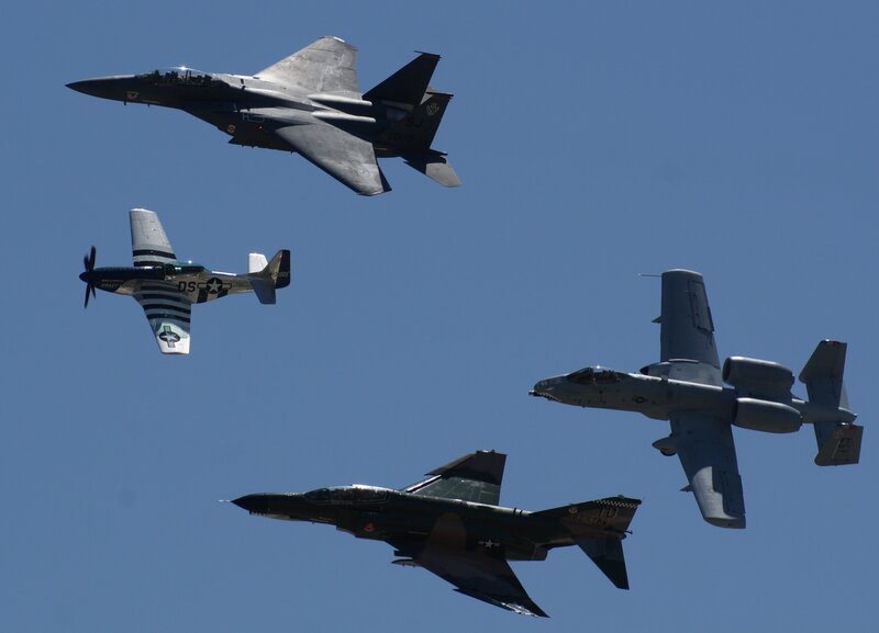 Four military aircraft in formation