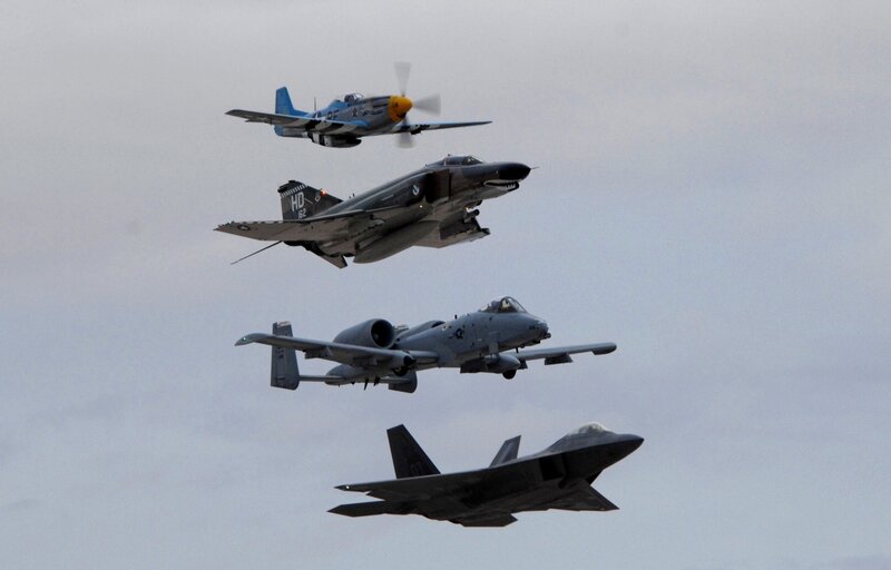 Four military aircraft in formation