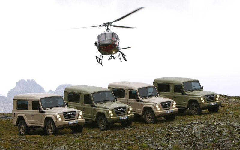 Four Military Vehicles — Green