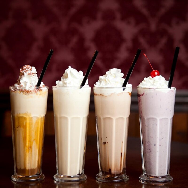 Four Milkshakes in Glasses