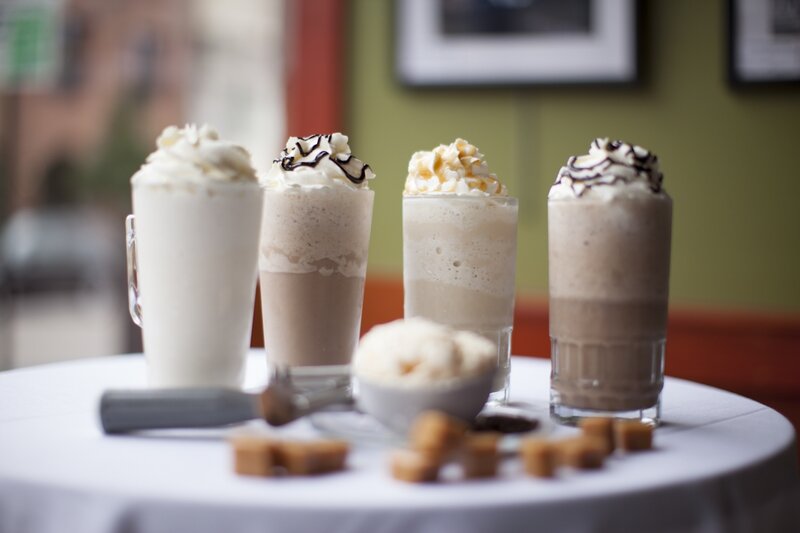 Four Milkshakes on Table