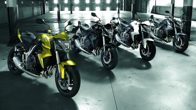 Four Motorcycles in Garage — Black