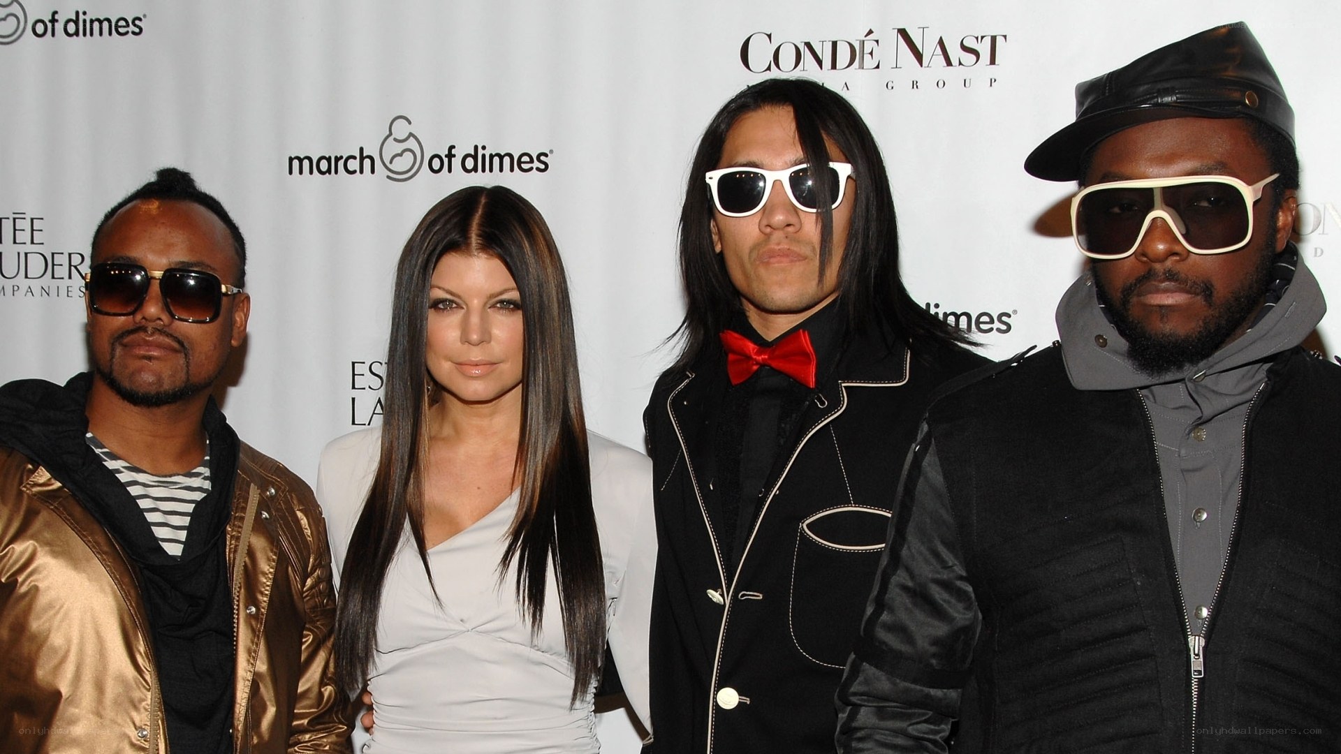 Four people at a charity event