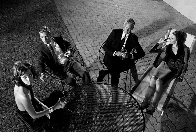 Four people at an outdoor gathering