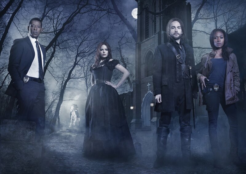 Four People in a Cemetery