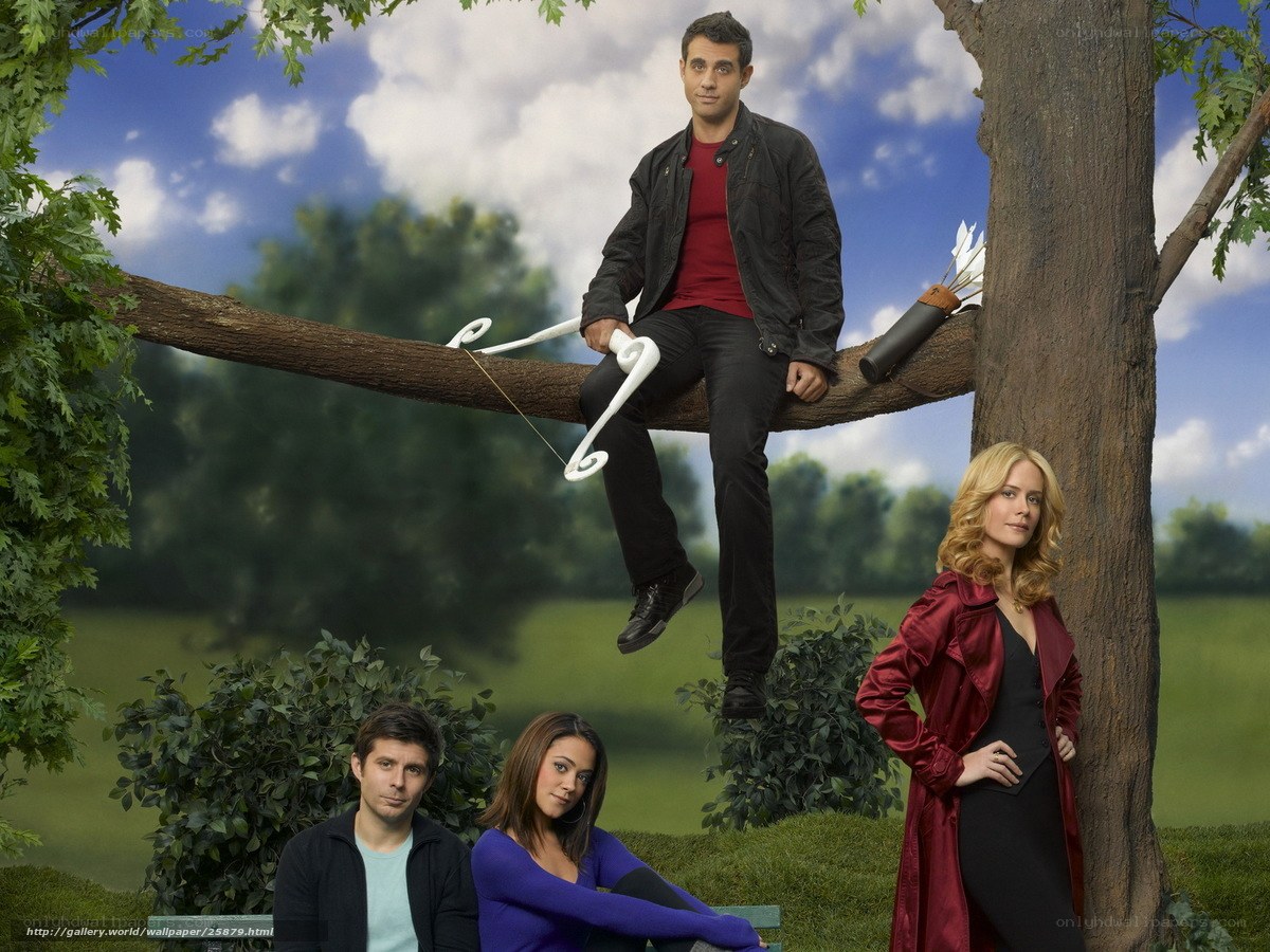 Four people in a park scene