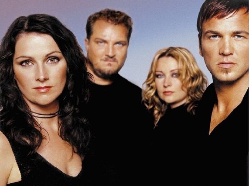 Four People in Black — Serious, Photograph