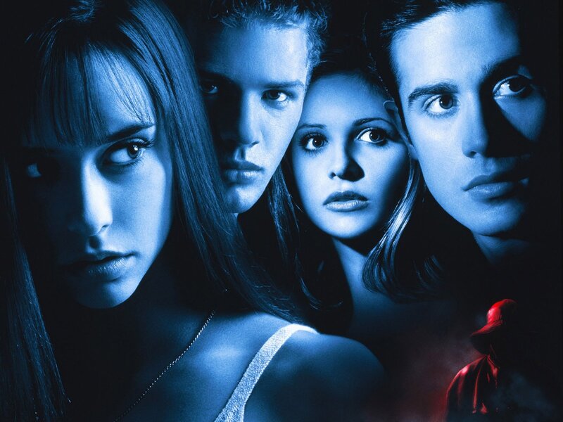 Four People in Blue Light