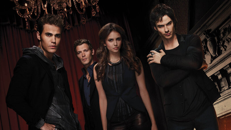 Four People in Dark Clothing — Black, Dramatic