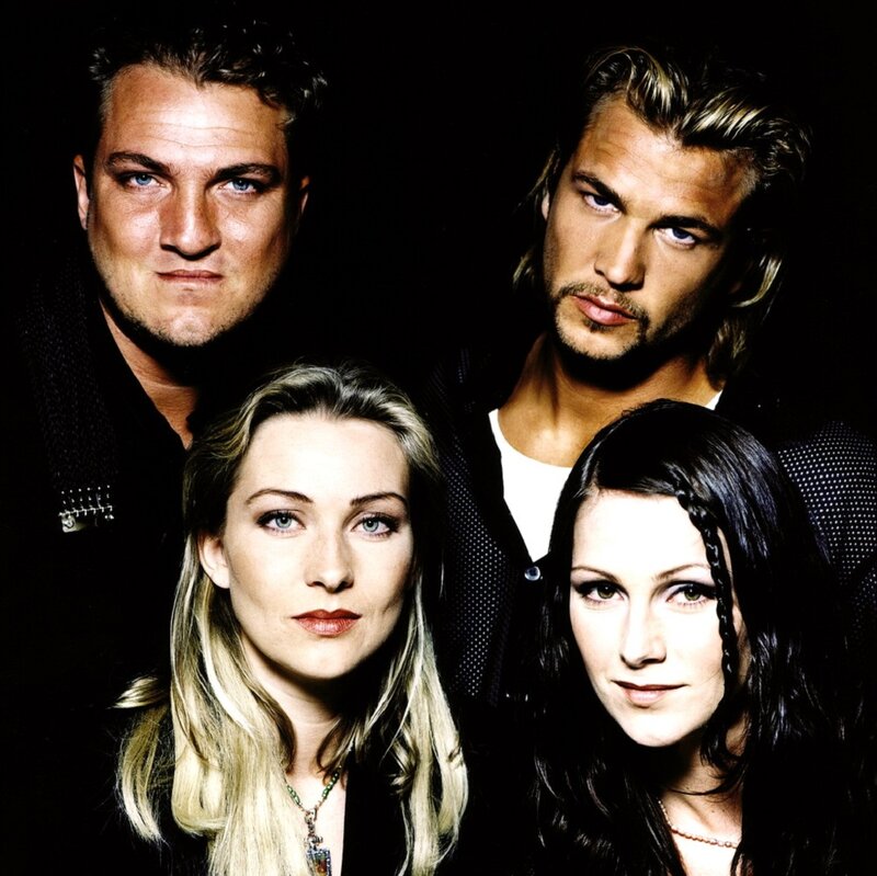 Four People in Dark Clothing — Black, Serious