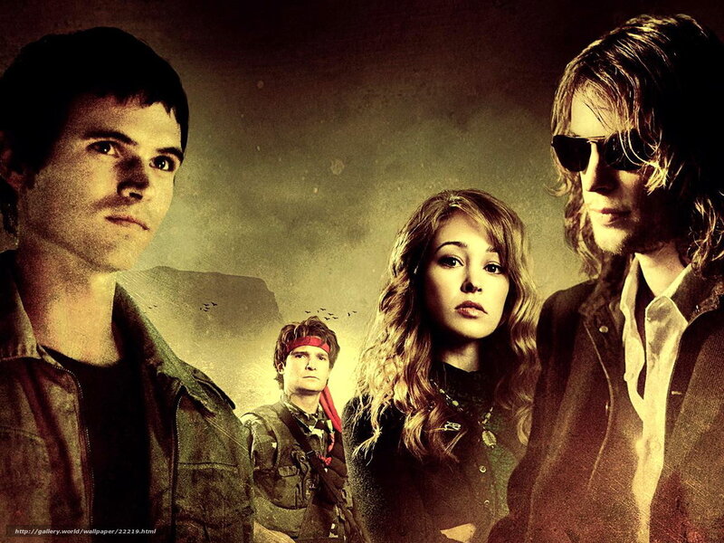 four people in dramatic lighting