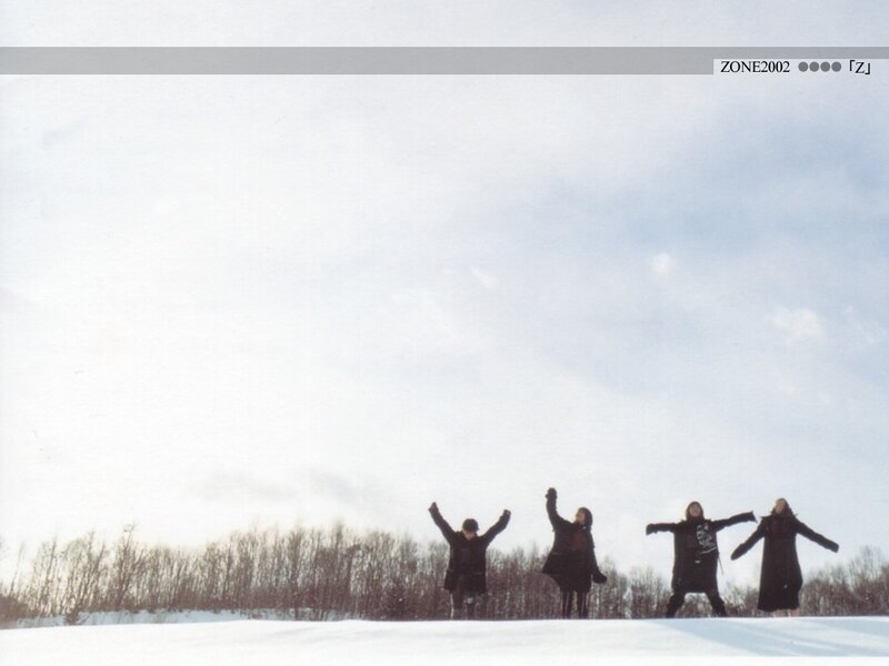 four people in snow