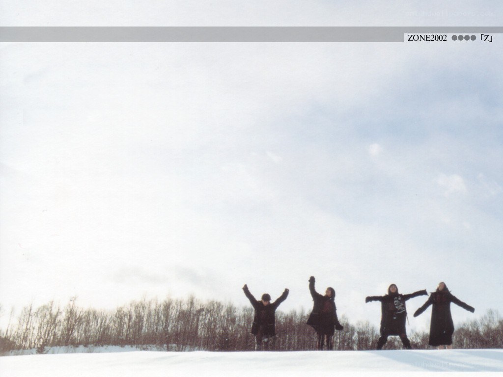 four people in snow