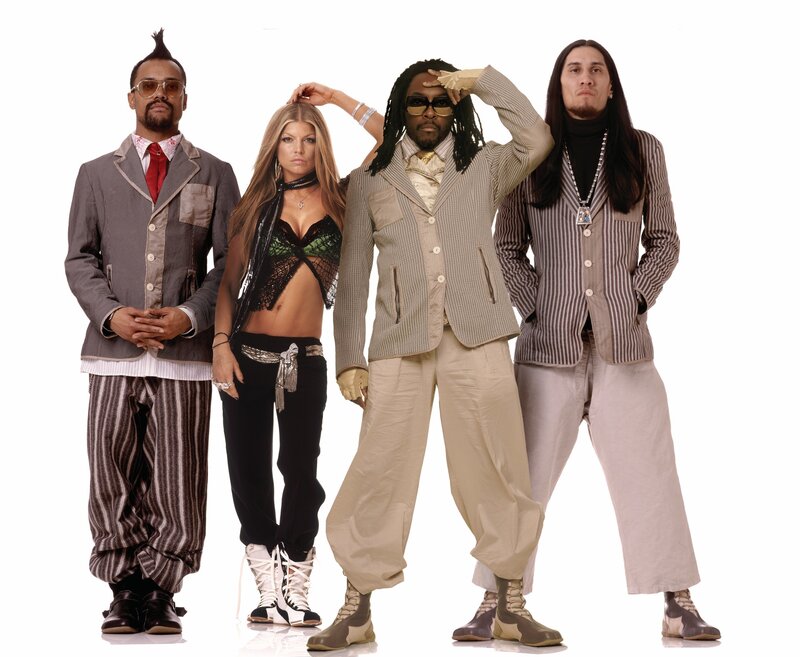 four people in stylish outfits