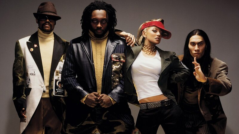 four people in stylish outfits