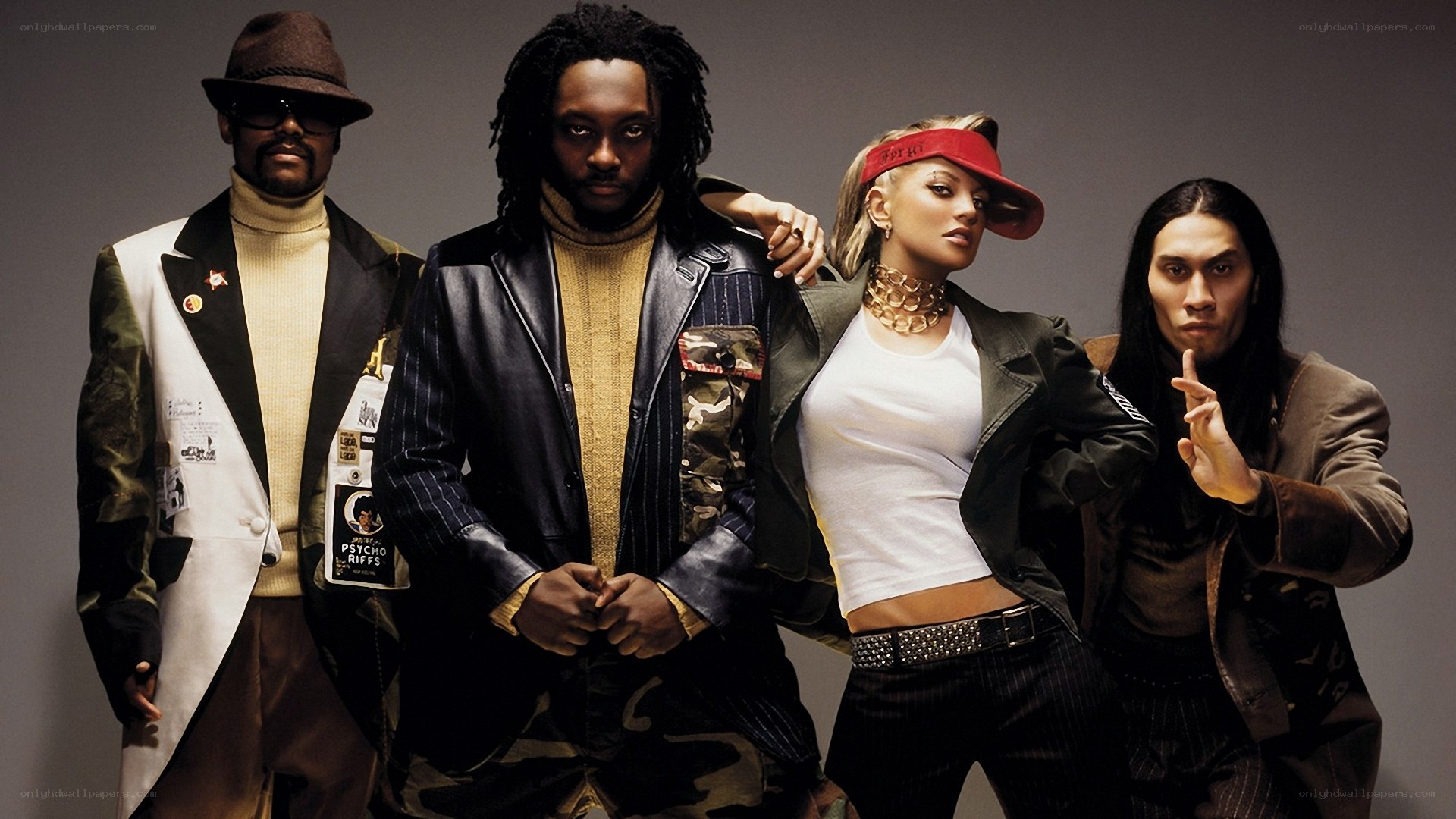 four people in stylish outfits